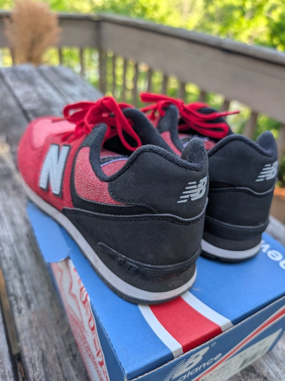 Red and Black New Balance 574 Youth size 6